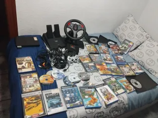 Consola Negra con 25 juegos y regalo 7 juegos más.
