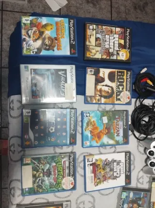 Consola Negra con 25 juegos y regalo 7 juegos más.