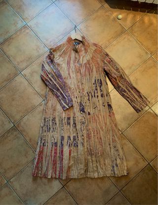 Gabardina guardapolvo, muy especial.