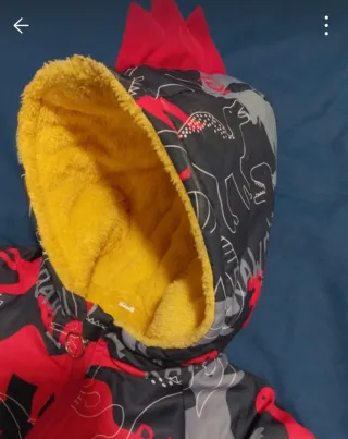 Giubbotto pile dinosauri