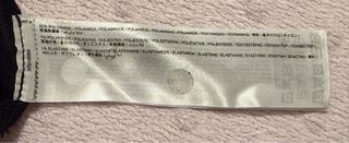 Top Mango brillante cuello alto