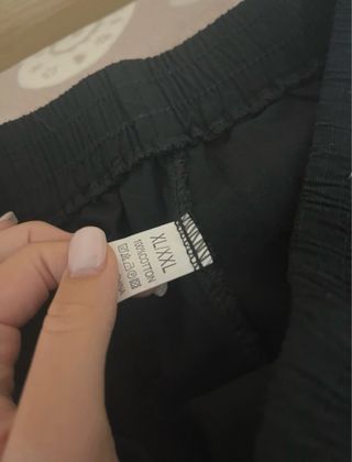 Pantaloni neri palazzo mezza stagione