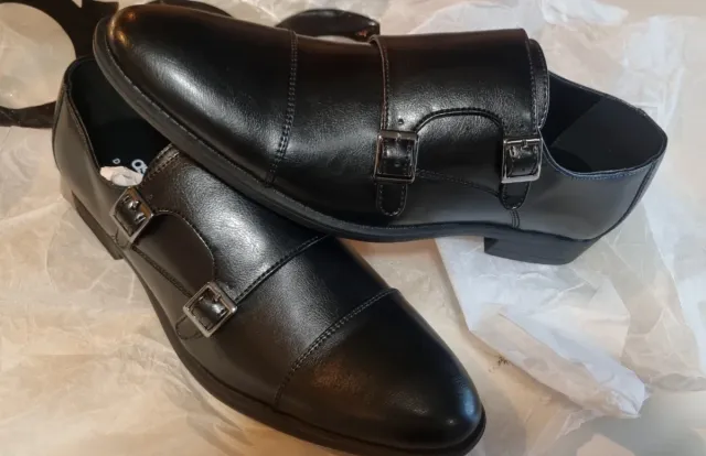 Zapatos de vestir negros con doble hebilla