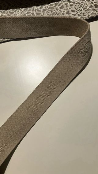 Bolso Tous estampado marrón y beige