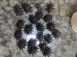 20 pinze decorative a forma di sole in ferro