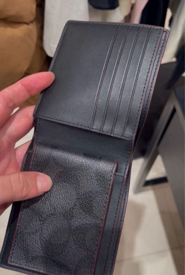 Cartera y tarjetero Coach Negra Monograma