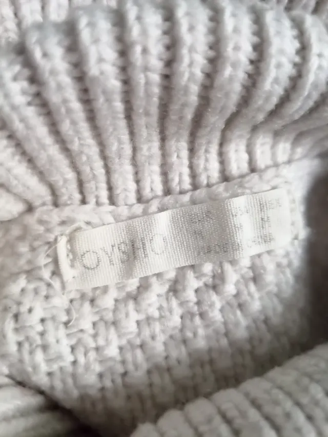 Jersey cuello alto blanco trenzado