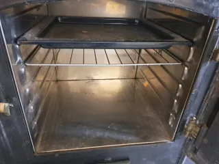 Cocina de leña Lacunza negra y dorada