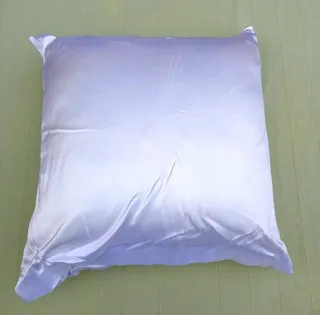 Cuscino decorativo poinsettia e candela