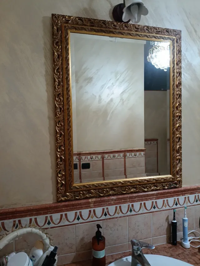 Specchio con cornice oro