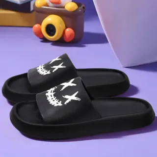 Zapatillas OURANNI negras con diseño de cara