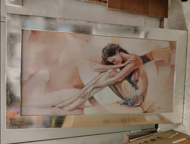 Cuadro mujer firma René