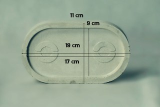 Set di vaso e piatto in cemento nero