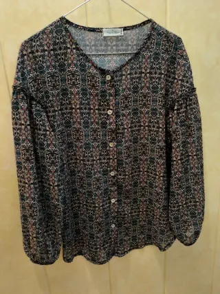 Blusa estampada manga tres cuartos