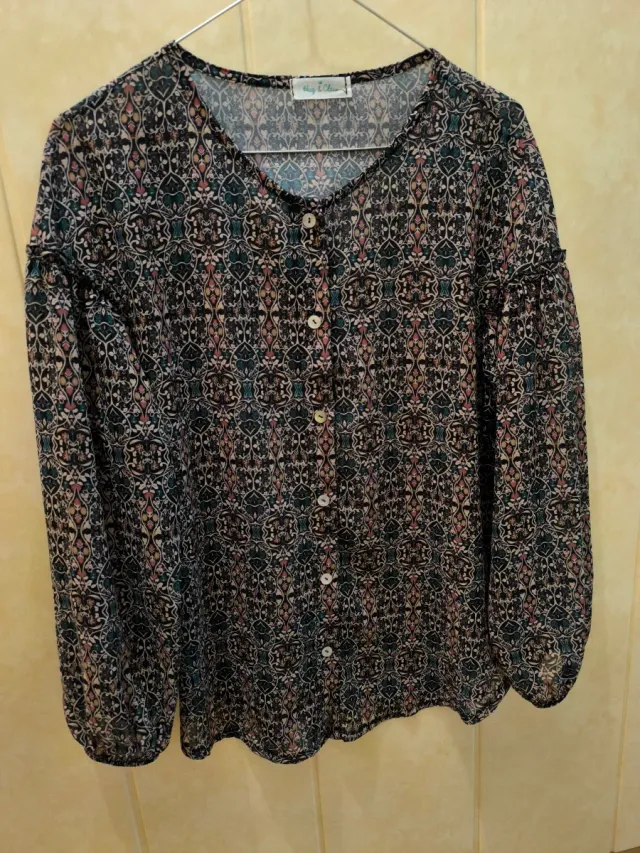 Blusa estampada manga tres cuartos