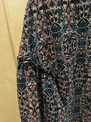Blusa estampada manga tres cuartos