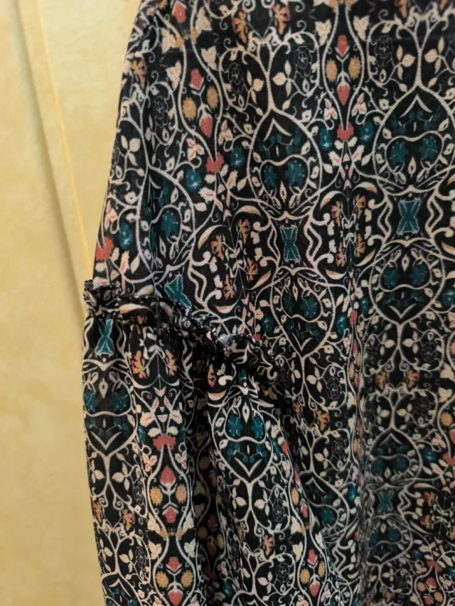 Blusa estampada manga tres cuartos