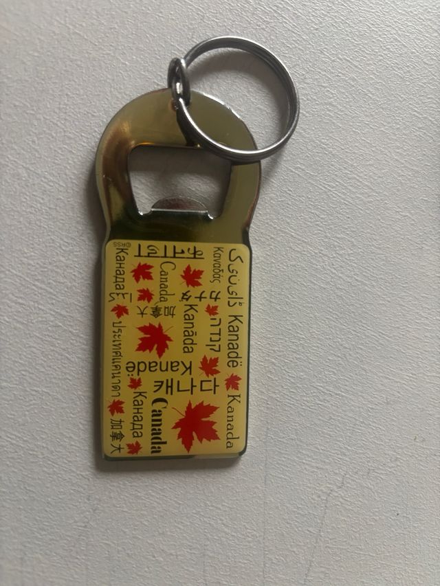 Apribottiglie portachiavi Canada multilingue