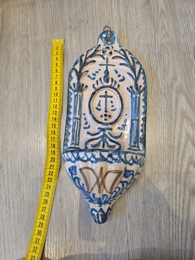 Benditera de cerámica azul y rosa