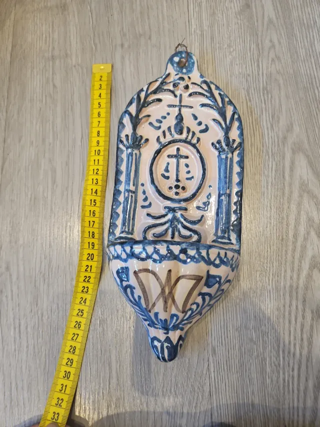 Benditera de cerámica azul y rosa