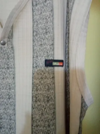 Camiseta sin mangas rayas beige y gris