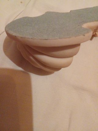 Acquasantiera  con volto di Gesù