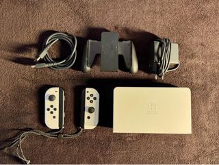 Nintendo Switch OLED Blanca + 2 juegos (Animal Cro