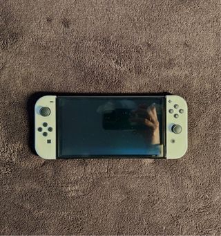 Nintendo Switch OLED Blanca + 2 juegos (Animal Cro
