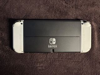 Nintendo Switch OLED Blanca + 2 juegos (Animal Cro