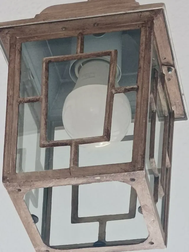 Lámpara colgante de metal y cristal