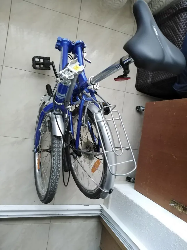 Bicicleta plegable azul, marca Romester Alloy