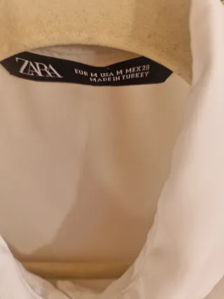 Camisa ZARA blanca con volantes