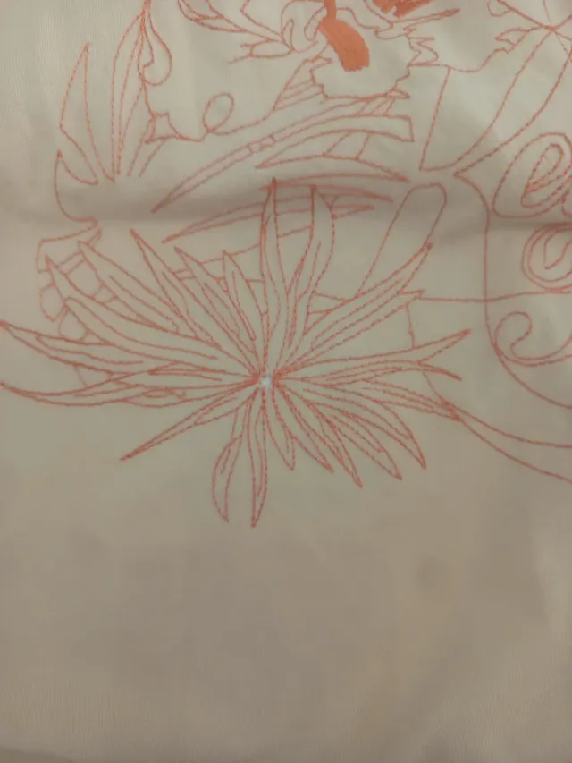 Polo beige con bordado