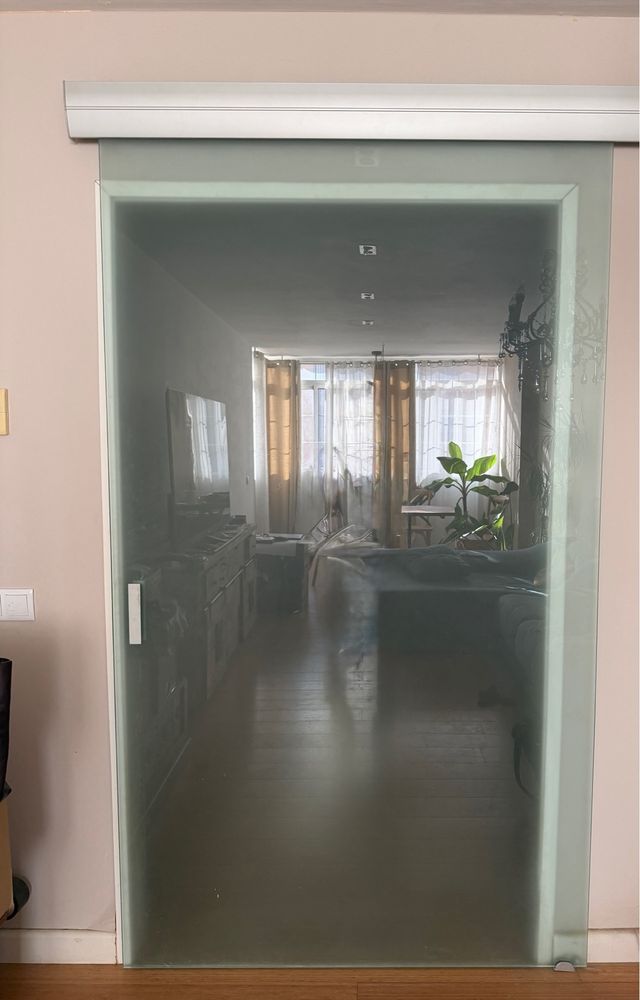 Puerta corredera de cristal