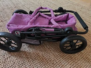 Silla de paseo para muñecas color lila plegable
