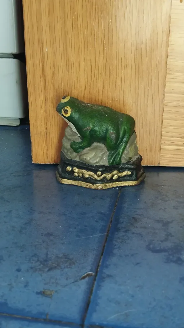 Sujetapuertas de hierro fundido