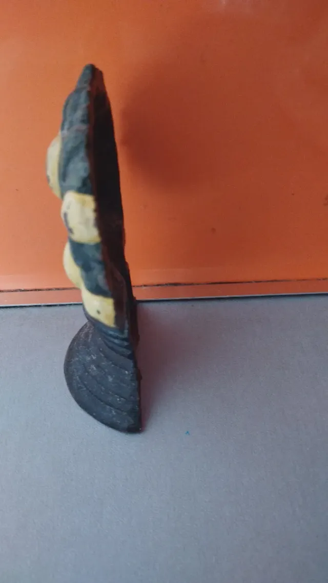 Sujetapuertas de hierro fundido