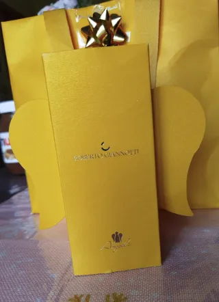 Collana con angelo e pietra rosa