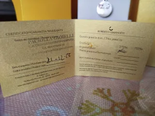 Collana con angelo e pietra rosa