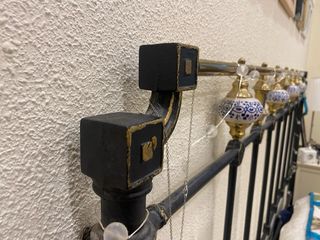 Cabecero vintage metal negro y dorado