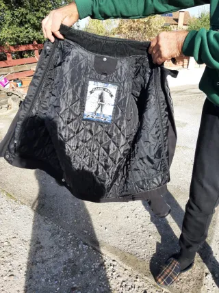 Chaqueta de moto negra y gris