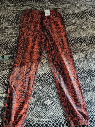 Pantalón chándal estampado serpiente naranja