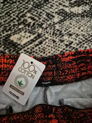 Pantalón chándal estampado serpiente naranja