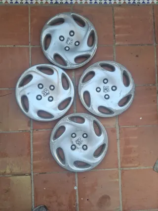 4 Tapacubos Peugeot 15€