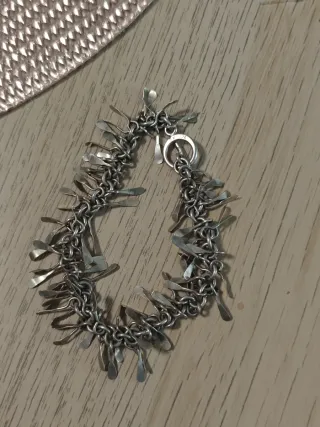 Pulsera de plata con colgantes