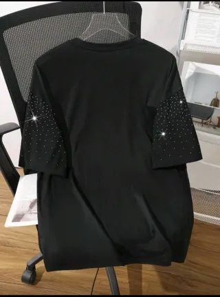 Maglia nera vintage per la taglia scrivetemi