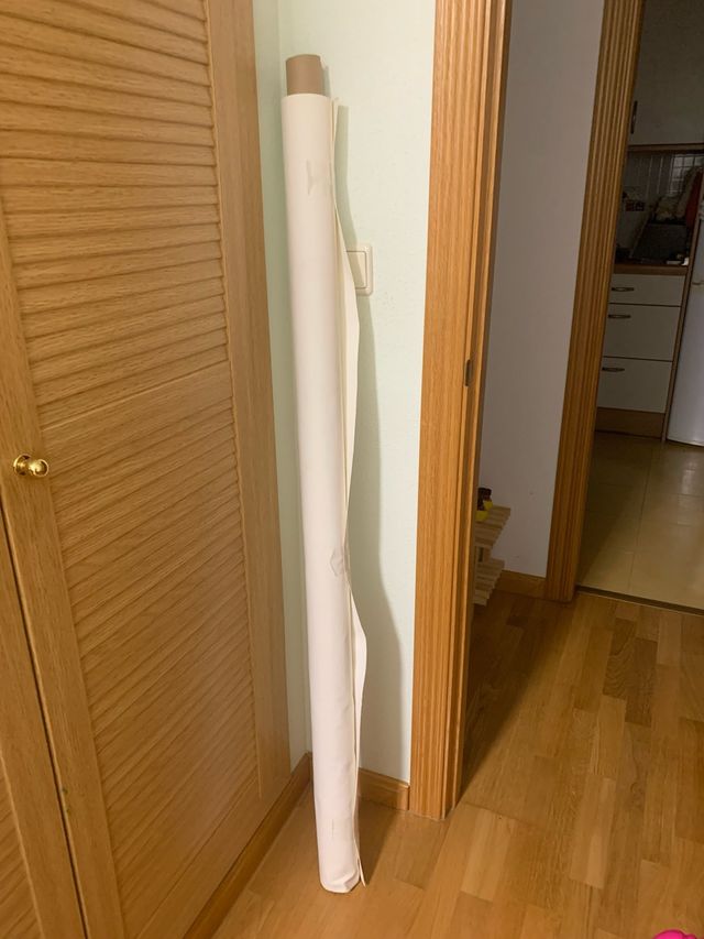 Rollo rizo impermeable y 2 retales