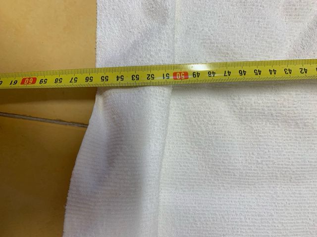 Rollo rizo impermeable y 2 retales