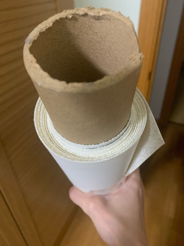 Rollo rizo impermeable y 2 retales