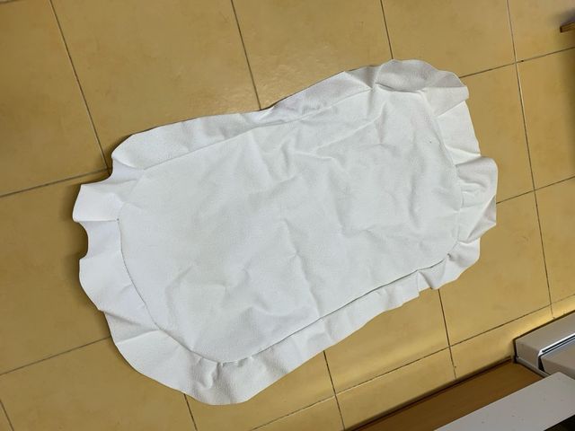 Rollo rizo impermeable y 2 retales